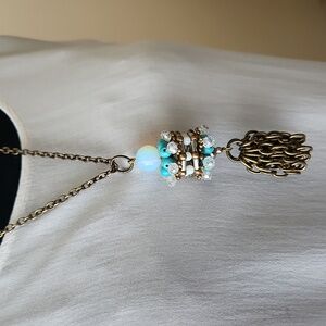 PAM HIRAN Brass Dianthus Tassel Pendant Necklace from Anthropologie